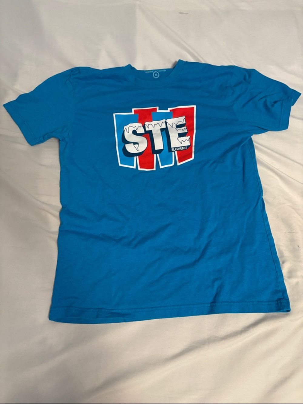 Sled the east icee shirt